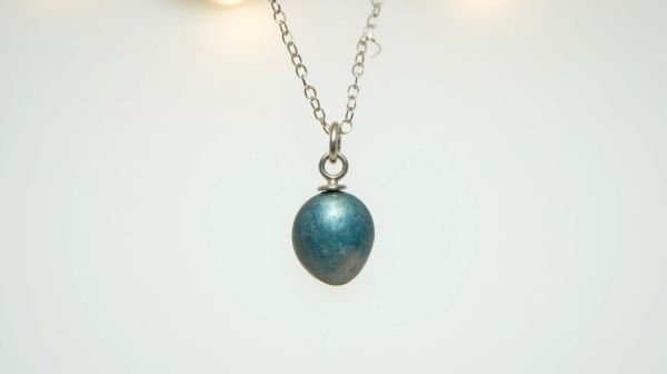 Unlock the elegance of unique blue charms for your jewelry